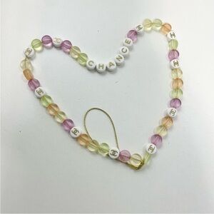 Chanel beauty gift phone charm